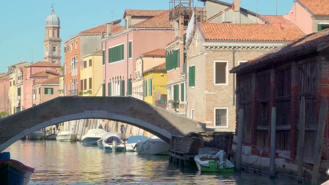 2587_A_small_bridge_connecting_houses_and_buildings_in_Venice_Italy.mov