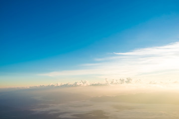 Sunrise scenic with colorful majestic sky and fog on peak of mountain