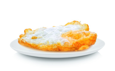 Fried egg in white plate on white background