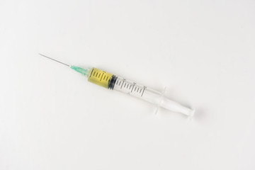 Syringe closeup isolated on white background