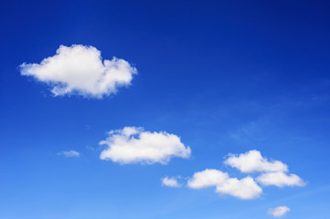 Naklejka na ściany i meble white clouds with blue sky background