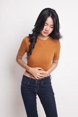 Young Asian woman got stomachache.