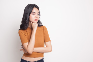 Serious  young Asian woman  look away.