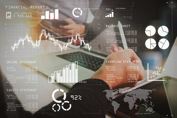 Business team meeting present. Photo professional investor working with new startup project. Finance managers meeting.Digital tablet laptop computer design smart phone using.Sun flare effect