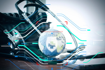 Studio macro of a stethoscope and texture globe with digital tablet with shallow DOF evenly matched abstract as medical network concept