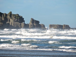 Turbulent sea and rock formations, New Zealand