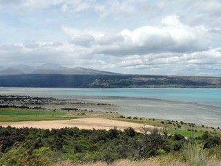 Fuzzy lakeshore of turquoise Lake Pukaki, New Zealand
