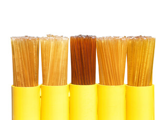 Honey Straws in a display isolated on white. Pure honey, blackberry, wildlfower, lemon and Orange...