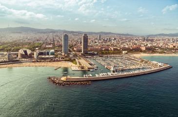 Fototapeta premium Barcelona aerial view of Port Olimpic and the beach, Spain. Vintage colors