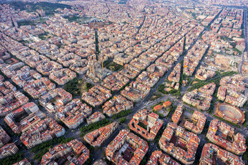 Barcelona aerial view, Eixample residencial district with typical urban squares, Spain. Late afternoon light