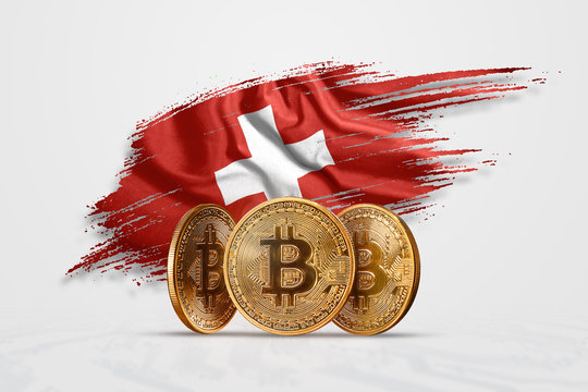 Crypto currency, gold coin BITCOIN BTC. Coin bitcoin against the background of the flag of Switzerland. The concept a new currency, Blockchain Technology , a token. Mixed media