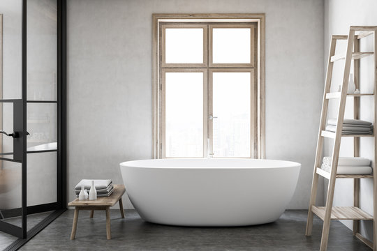 White bathtub in a luxury bathroom