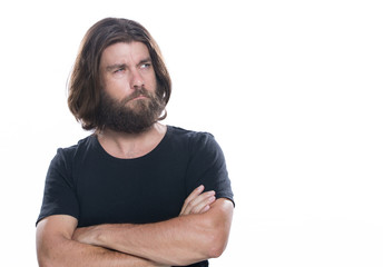 Fototapeta premium Portrait of handsome confident man with beard in standing with crossed arms isolated on white