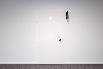 Closed door in a white wall room