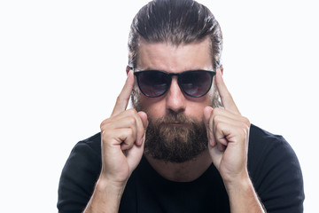 Fototapeta premium Portrait of cool serious man wearing sun glasses isolated on white