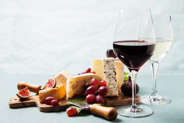 Variety of cheeses on serving board - 204729007