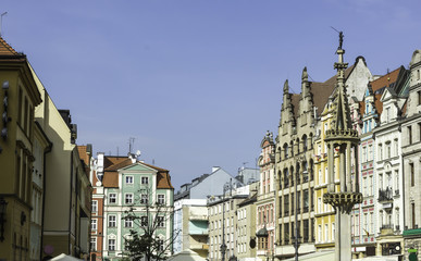 Refurbished buildings. Facades of buildings around the market square. Gothic and baroque details and building elements. Old Town in Wroclaw, Poland.