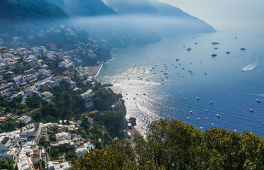 View of Positano town at Amalfi coastline. Colorful houses along the sea coast, Italy
