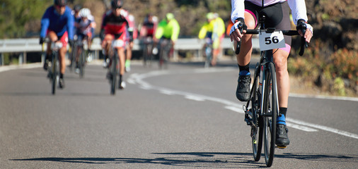 Naklejka na ściany i meble Cycling competition cyclist athletes riding a race