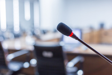 Microphone over the blurred business forum Meeting or Conference Training Learning Coaching Room...