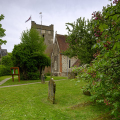 Spring afternoon light on an overcast day - View of St Mary's Church in Selborne, Hampshire, UK