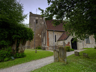 Spring afternoon light on an overcast day - View of St Mary's Church in Selborne, Hampshire, UK