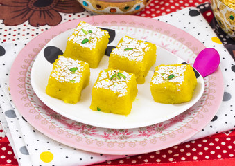 Indian Sweet Kopra pak Also Know as Barfi is a Gujarati style of making coconut burfi. This sweet or mithai is made from freshly grated coconut, sugar, milk and mawa.