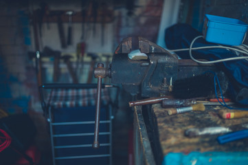Work bench in shed with tools