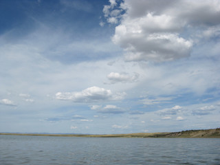 the sky reflected in the water, deserted beach lake, summer sky, nature, blue cloud,