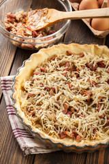 Making stuffing while preparing a traditional quiche