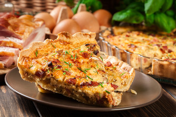 Pieces of quiche lorraine with bacon and cheese