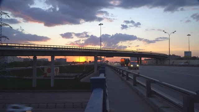  traffic on the urban thoroughfare, overpass,  and road junction at sunset