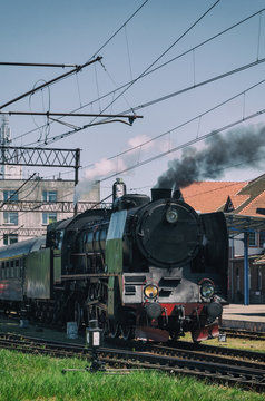 Fototapeta STEAM LOCOMOTIVE - Vintage train at the station