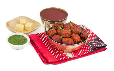 Indian Cuisine Vegetable Manchurian Also Know as Gobi Manchurian is a popular Indo Chinese Street food isolated on white background