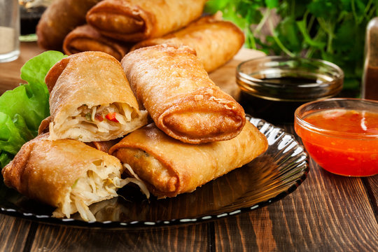 Spring rolls with chicken and vegetables served with sweet chili sauce or soy sauce