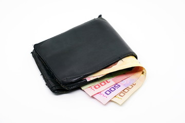 Old wallet with banknote on isolate background