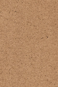 High resolution photograph of recycle paper light brown coarse grain grunge texture sample