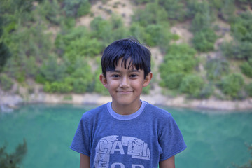 Happy boy is looking at camera in Atakoy,Turkey 