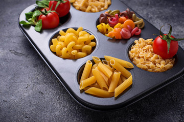 Various type of pasta and cherry tomato