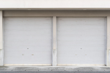 Closed white roller shutter door