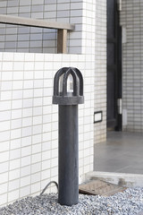 Outdoor lamp in front of building