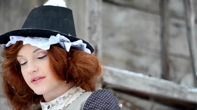 Red-haired girl with a magic rat. Fairy tale characters. close-up