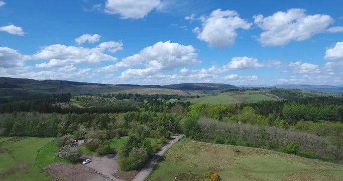Aerial footage over Mugdock Country Park near Milngavie in Central Scotland.
