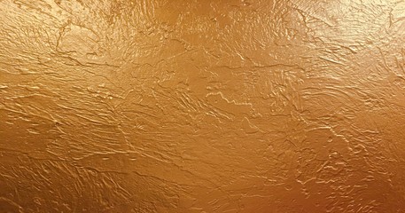 gold background paper, texture is old vintage distressed solid glitter gold color with rough peeling grunge paint on edges.