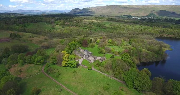 Aerial footage over Mugdock Country Park near Milngavie in Central Scotland.