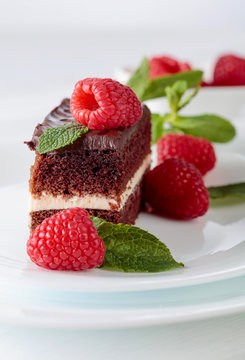 Chocolate cake with raspberry and mint.
