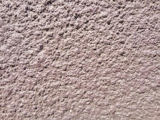 pink rough surface of architecture panel