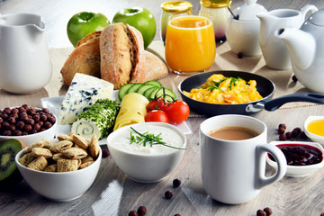 Breakfast served with coffee, cheese, cereals and scrambled eggs