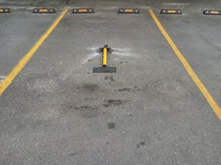 empty parking lot with yellow border lines.