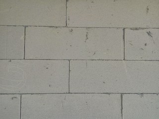 layers of white bricks in constructino area.